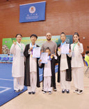 At the 10th Macau International Martial Arts Festival, Coach Yiyi led her students to gold medal honors in the championship competition.